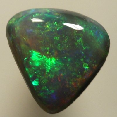 SOLID BLACK OPAL Bright green and orange over dark green